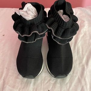 Black ruffle sock trainer